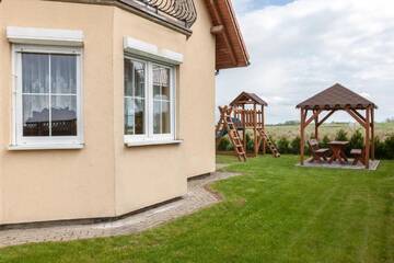 Фото номера Дом с 4 спальнями Дома для отпуска Holiday House Mewa by Renters г. Мендзыводзе 8