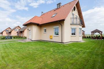 Фото номера Дом с 4 спальнями Дома для отпуска Holiday House Mewa by Renters г. Мендзыводзе 10